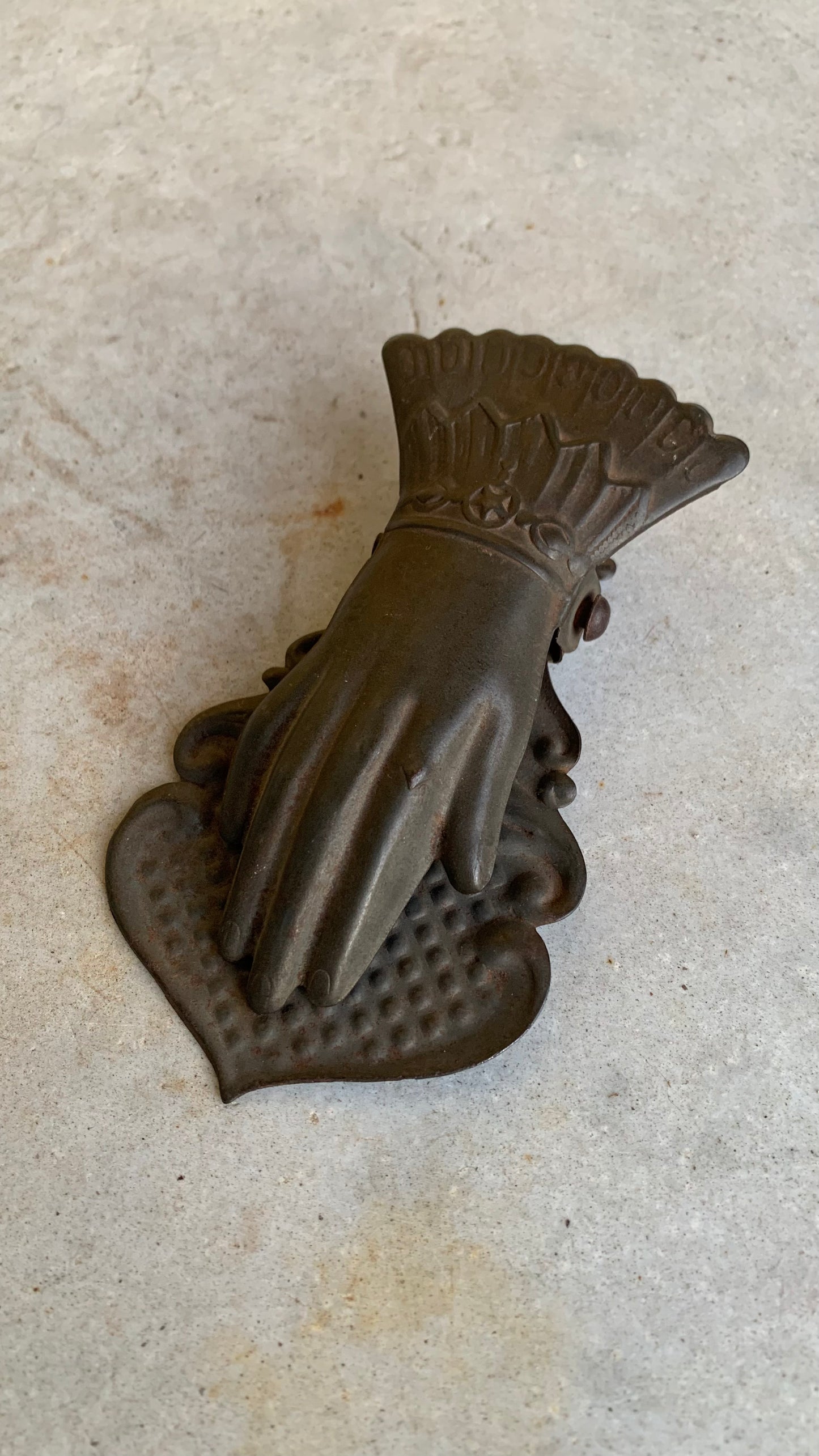 Victorian pressed brass letter clip