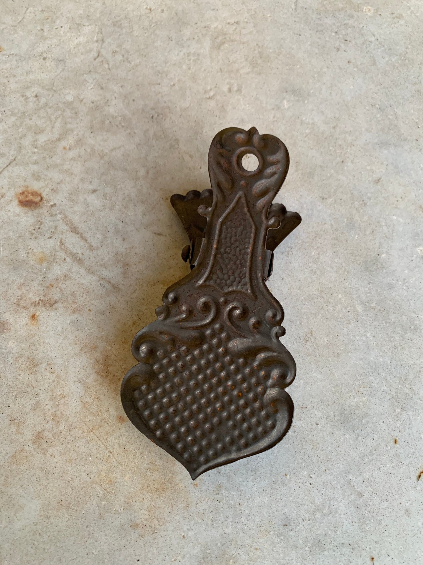 Victorian pressed brass letter clip