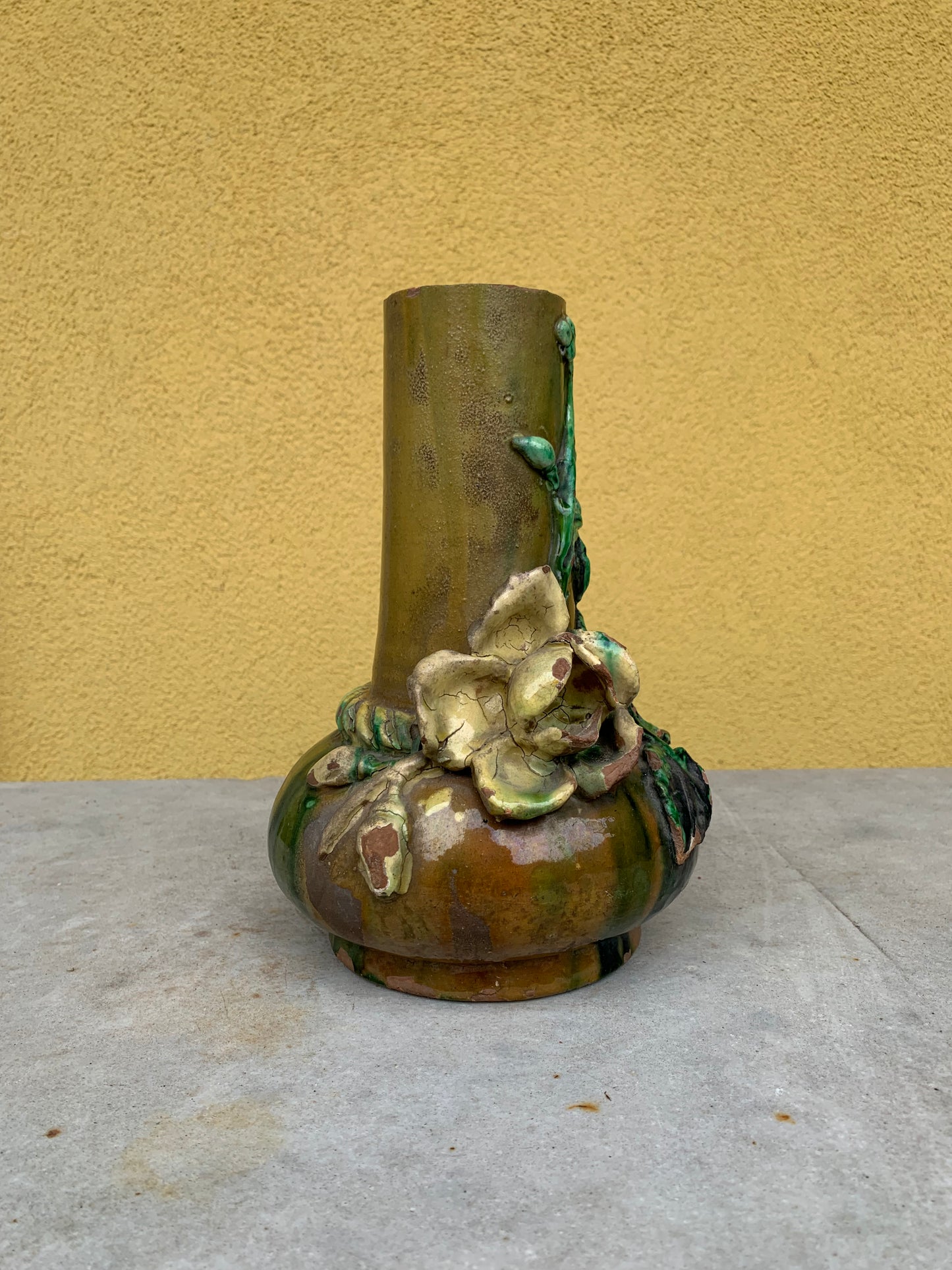 Terracotta vase branch