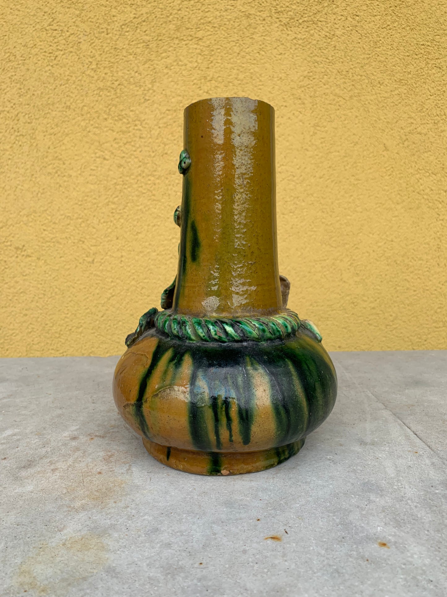Terracotta vase branch