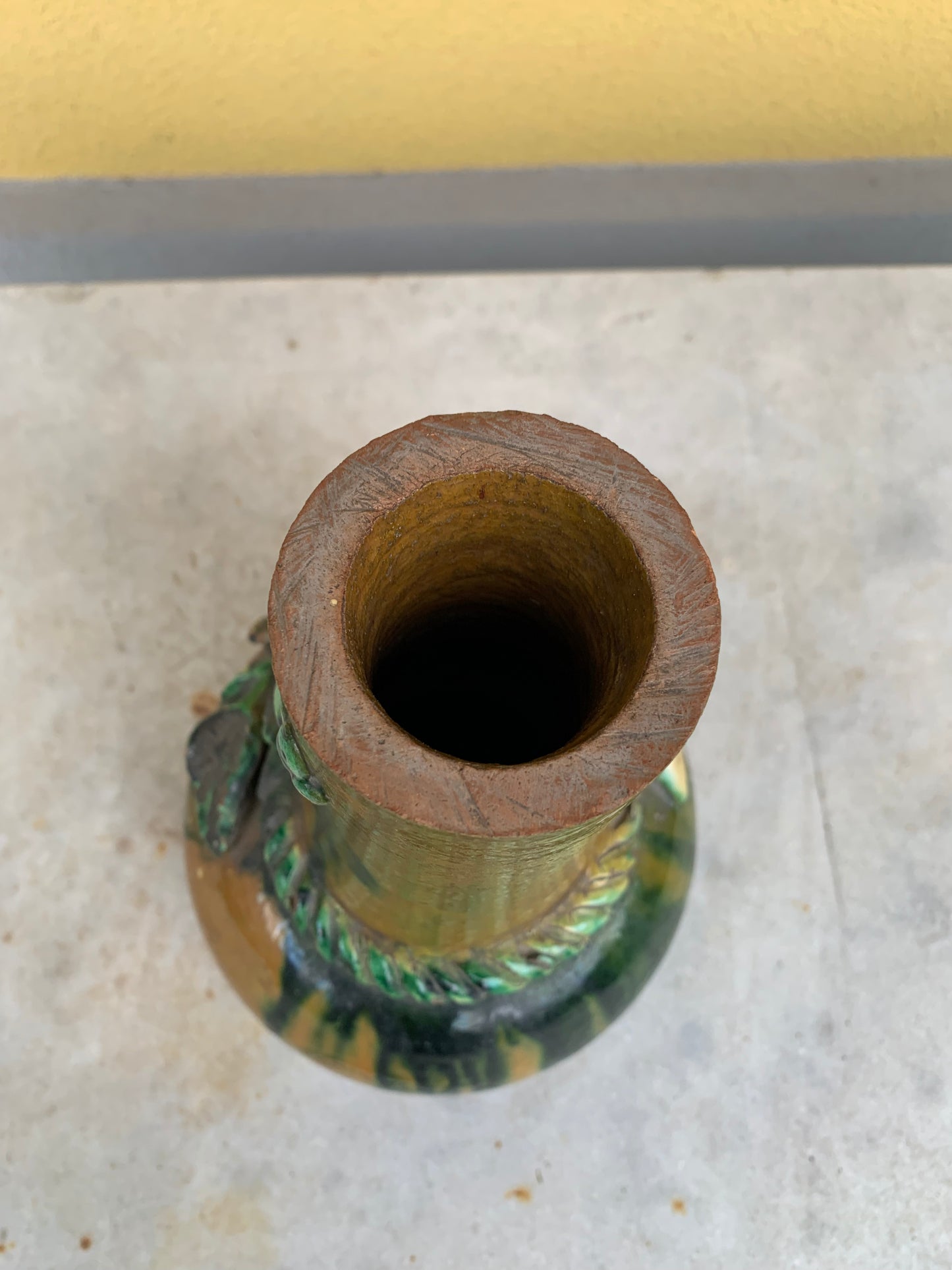 Terracotta vase branch