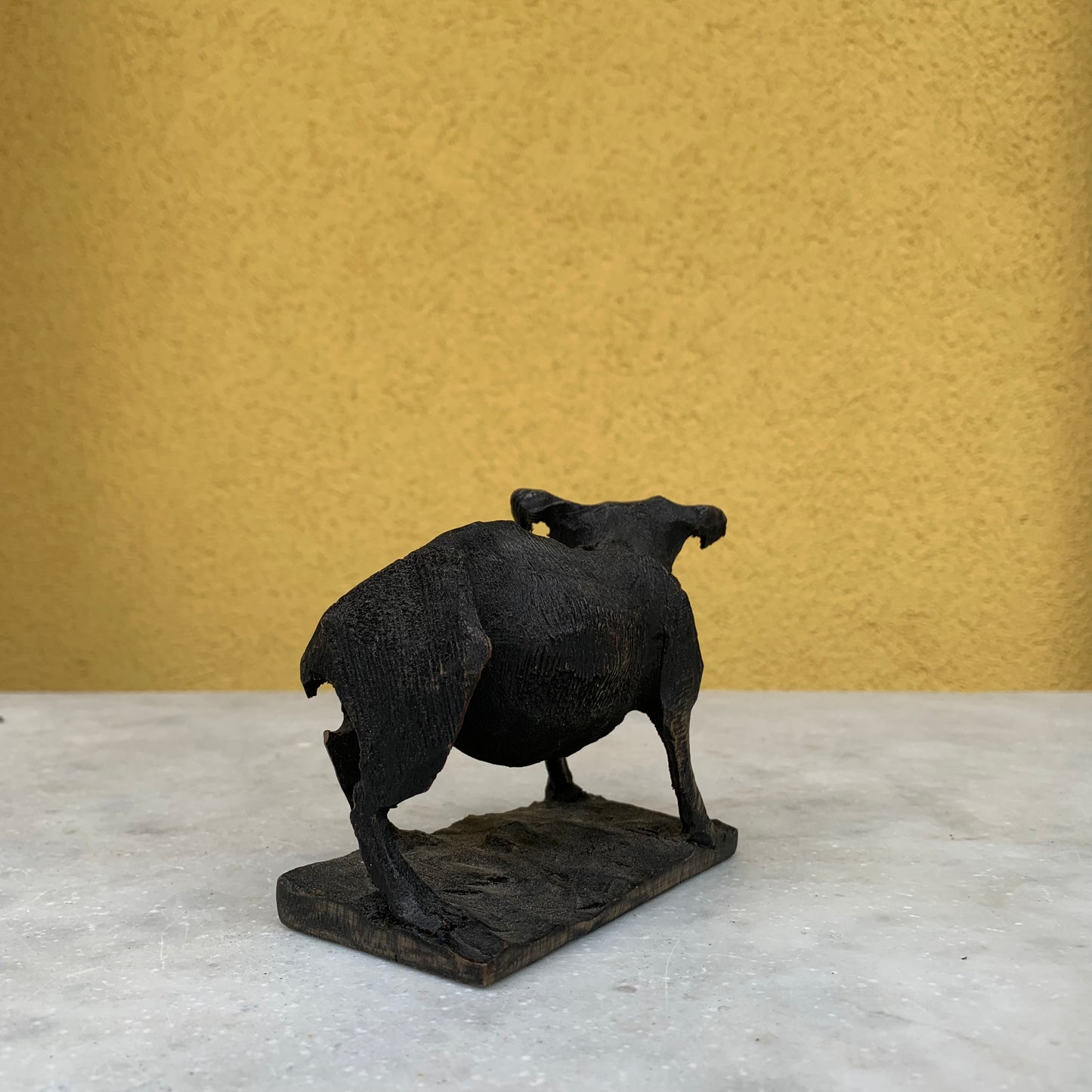 Vintage wooden dog sculpture