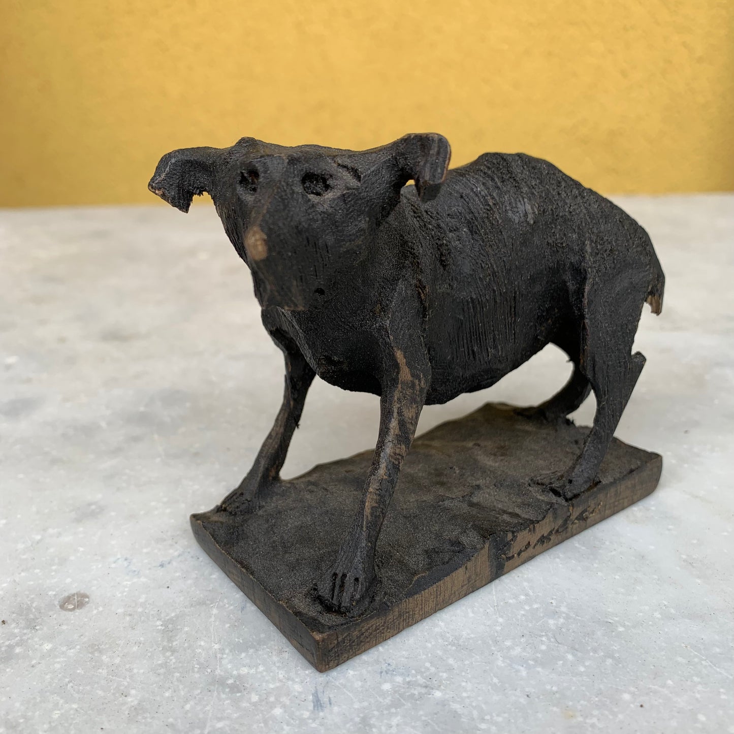 Vintage wooden dog sculpture