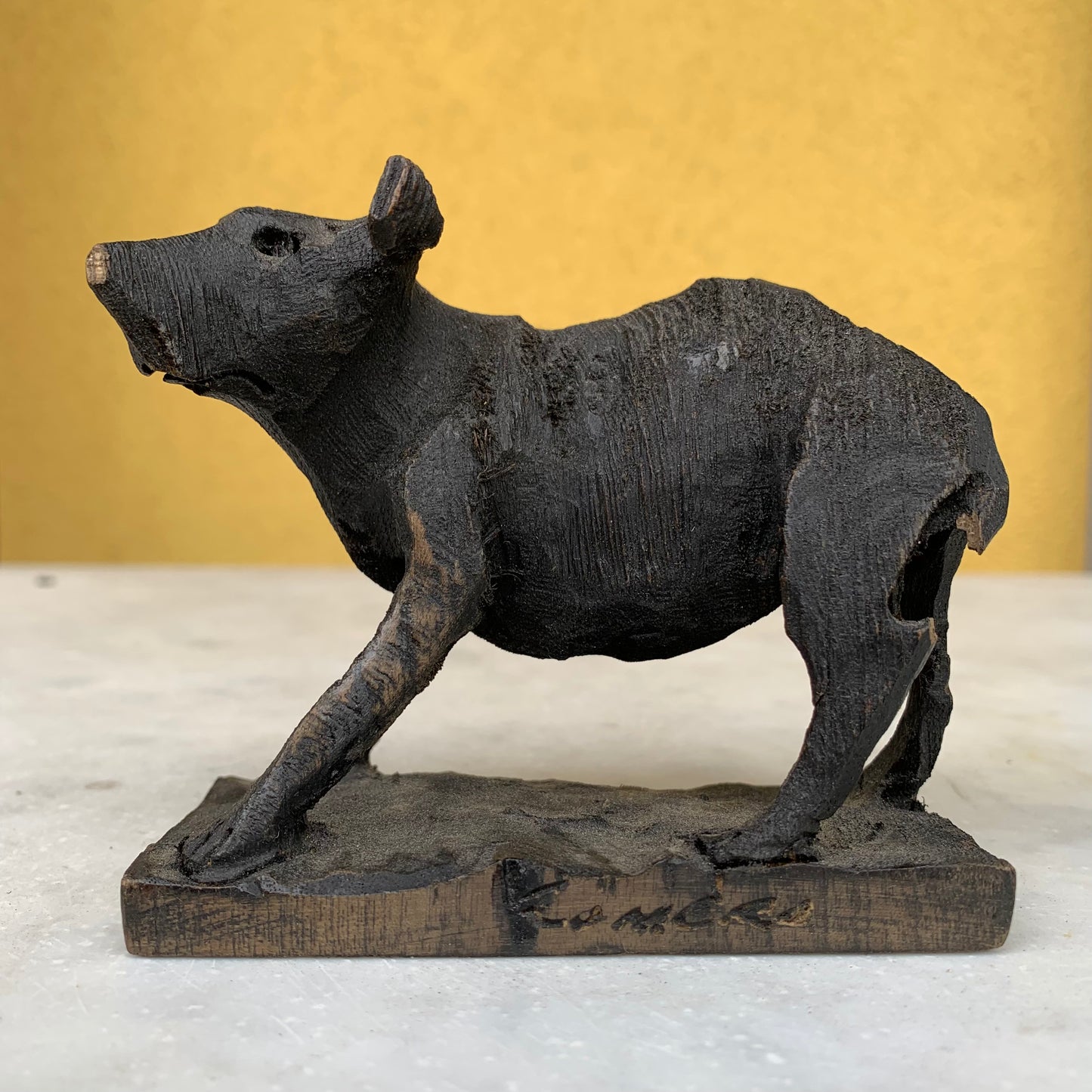 Vintage wooden dog sculpture
