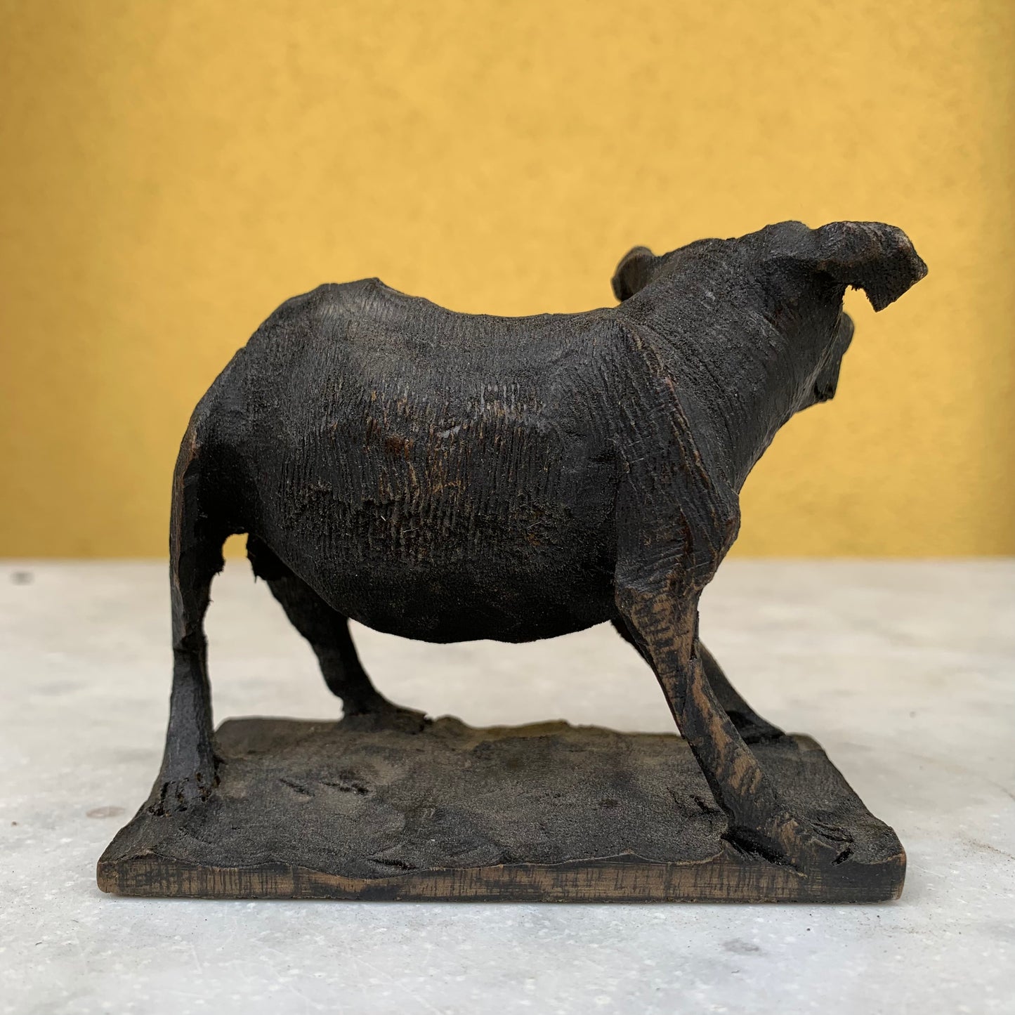 Vintage wooden dog sculpture