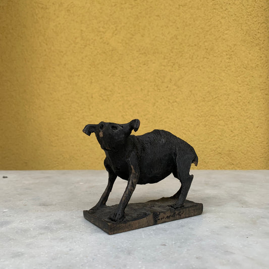 Vintage wooden dog sculpture