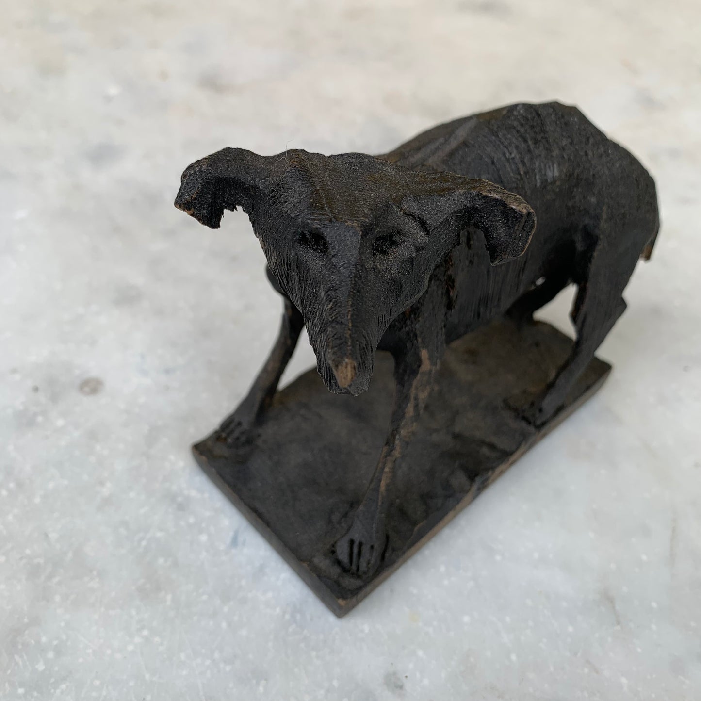 Vintage wooden dog sculpture